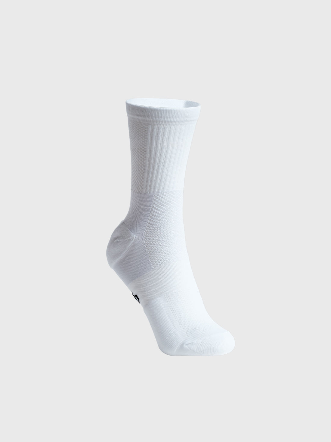 Single crisp white POP Running Co performance running sock against a clean background, highlighting the seamless toe construction.